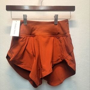 Outdoor Voices Women's Athletic Shorts in Rust Orange